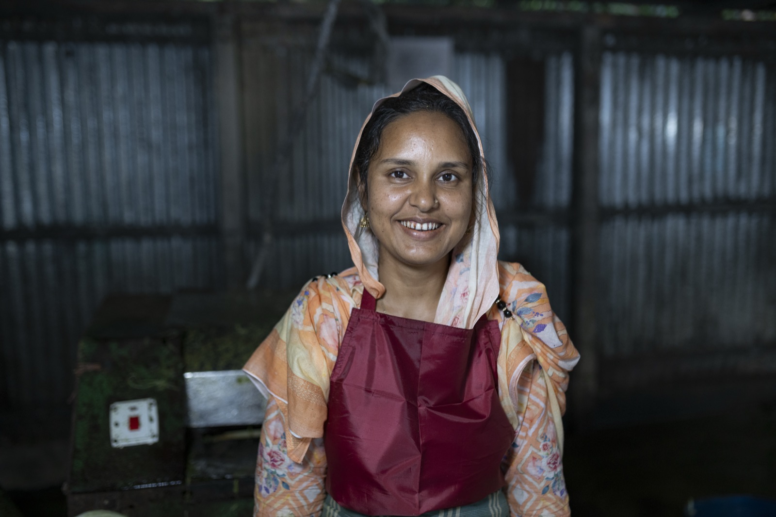 Worker processing pineapple fibre in Bangladesh