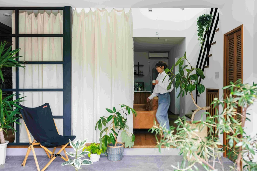 KICCA pineapple-fibre curtain by Kazuma hanging in a home interior